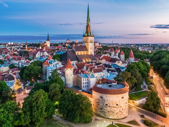 A nighttime view od the Old Town and the medieval Fat Margaret cannon tower in Tallinn, Estonia